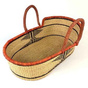 Natural elephant grass Moses basket with sturdy leather handles.