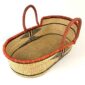Natural elephant grass Moses basket with sturdy leather handles.