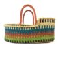Moses baby basket showing its breathable woven elephant grass sides.