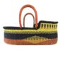 Natural woven baby basket with leather handle detail.