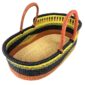 Portable Moses baby basket made from handwoven elephant grass.