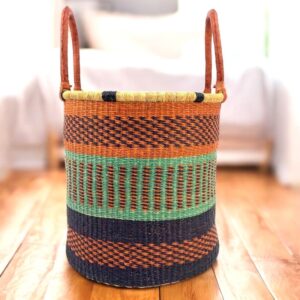 Handcrafted Ghanaian basket ideal for sorting laundry or household essentials.