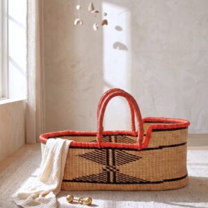 Moses baby basket showing its breathable woven elephant grass sides.