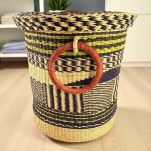 Closed laundry basket featuring artisan weave, durability, and refined home style.