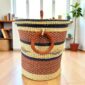 Bolga laundry basket with lid handwoven from elephant grass in Ghana