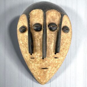 Traditional Kwele mask with rounded contours