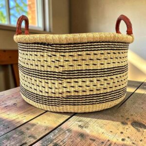 Handwoven Ghanaian hamper basket with a generous open interior.