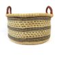 Large bowl-shaped basket made from natural elephant grass.