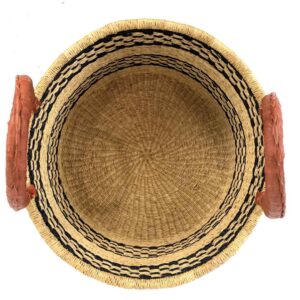 Hamper-basket-185-pronto (2) Large natural basket used for laundry storage in a home.