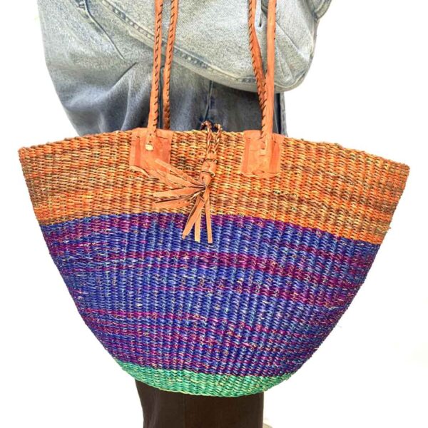 Hand-bag-184-watershed (2) Chic round basket with leather handles.