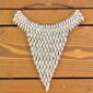 cowrie necklace chest plate
