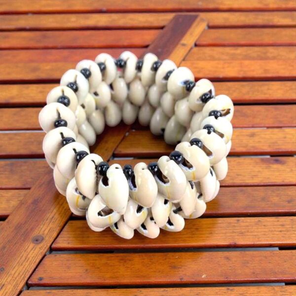 Handmade Ghanaian cowrie shell bracelet arranged in circle showing full design - Crest bracelet