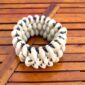 Handmade Ghanaian cowrie shell bracelet arranged in circle showing full design - Crest bracelet