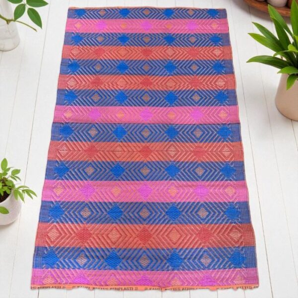 L-afri-mat-040-Francesca (1) West African handwoven mat made from recycled fibers for practical home décor.