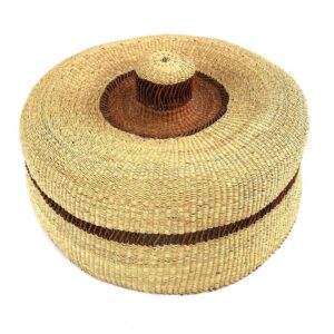 Studio shot of the natural straw lampshade with a thin rust stripe