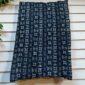 Textured African textile finished with natural earth dyes.
