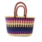 Oval basket used for storing household items and belongings.