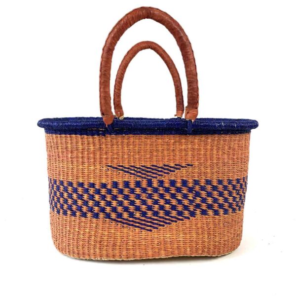 Oval-Basket-465-tangelo (1) Oval basket used for storing household items and belongings.