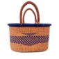 Oval basket used for storing household items and belongings.