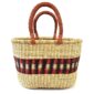 Front view of the natural oval Bolga shopper basket with red and purple band