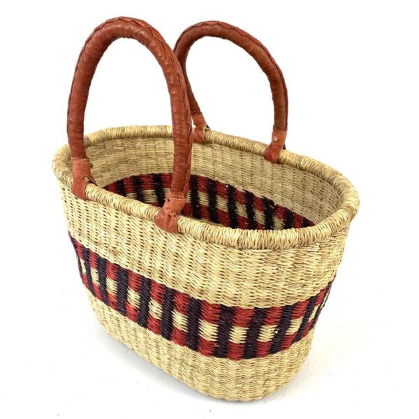 Oval-Basket-471-Barbuda (2) Angled view of the red and purple oval Bolga basket showing the woven interior