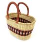 Angled view of the red and purple oval Bolga basket showing the woven interior