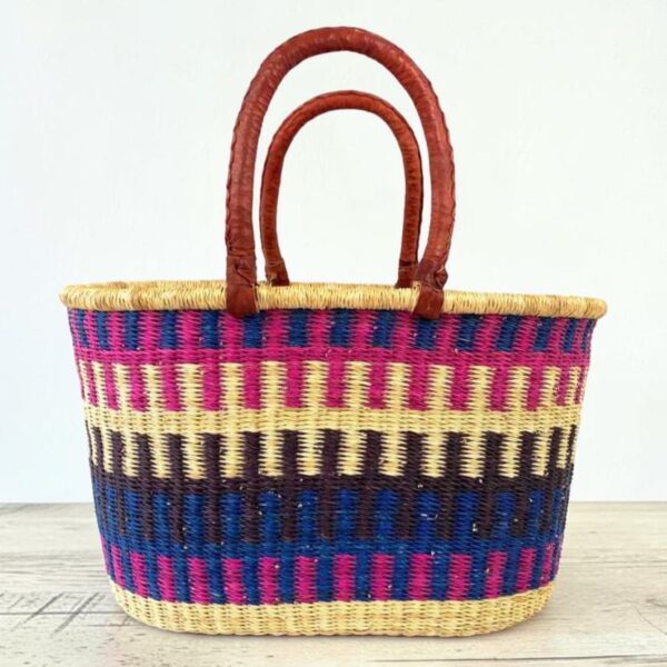 Natural Bolga oval basket with a spacious open interior.