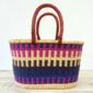 Natural Bolga oval basket with a spacious open interior.