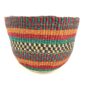 Handwoven planter designed to frame plants with texture and visual depth