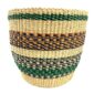 Artisan basket crafted from elephant grass using heritage weaving methods