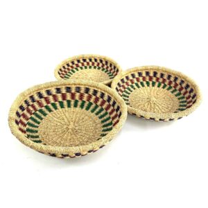 Artisan woven Bolga platter set made from natural fibres, ideal for fruit, bread or home décor.