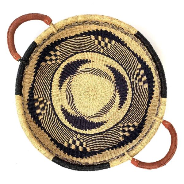 PlatterWithHandle-001-vinyl-top Bolga tray with leather handles, natural and navy swirl pattern, top-down view
