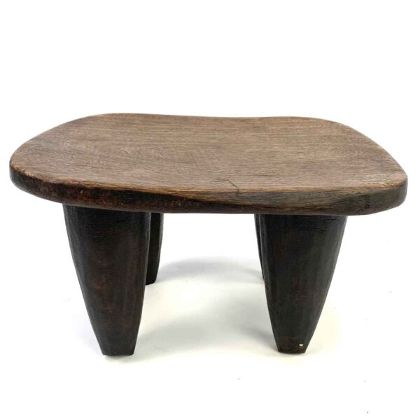 STAT-IV-Senu-060-connect (1) Traditional Senufo stool with smooth patina and organic lines, carved by artisans in West Africa.