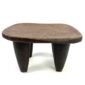 Traditional Senufo stool with smooth patina and organic lines, carved by artisans in West Africa.