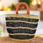 Artisan Bolga tote basket featuring traditional craftsmanship and modern versatility.