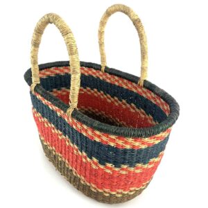 Side view of an oval-shaped vegan Bolga basket showing its spacious interior and durable, handle-free design.