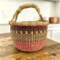 Handcrafted Ghanaian basket showing intricate weaving and strong cultural heritage traditions
