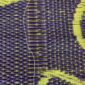 Handcrafted West African mat showcasing inconsistent weaving and organic decorative charm.