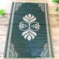 Extra-large African mat handwoven from recycled fibers for conscious interiors.