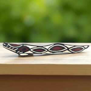 Decorative serpent mask symbolising protection and power