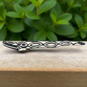 Artisan wood mask inspired by serpent mythology