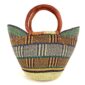 Front view of the classic market basket with a blocky geometric pattern in earthy tones