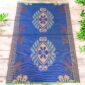 West African woven mat merging recycled artistry with bold, textural presence.