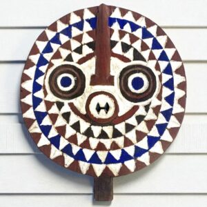Hand-carved Bwa sun mask symbolising protection and harmony.