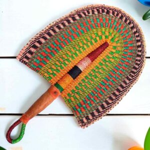 Woven Bolga hand fan in orange and green with a leather-wrapped handle