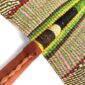 Close-up of the weave and leather handle on the natural and yellow Bolga fan