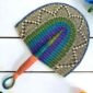Woven Bolga hand fan in blue and purple with a leather-wrapped handle