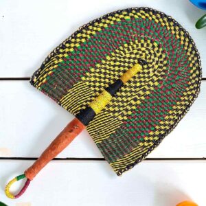 Woven Bolga hand fan in yellow and black with a leather-wrapped handle