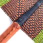 Close-up of the weave and leather handle on the lime and brown Bolga fan