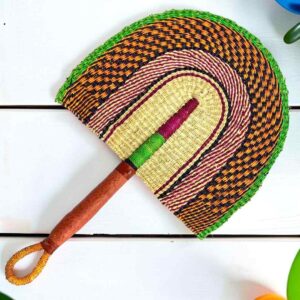 Woven Bolga hand fan in orange and pink with a leather-wrapped handle